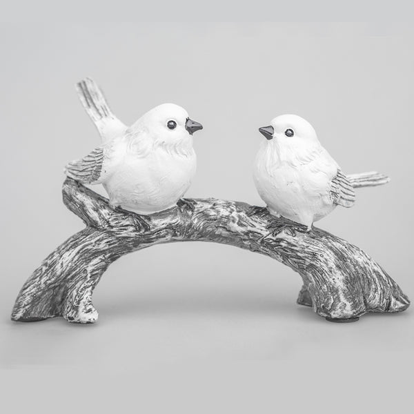 Two Birds on tree ornaments